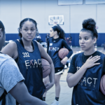 Young basketball athletes meeting a college coach at EXACT girls basketball college showcase camp